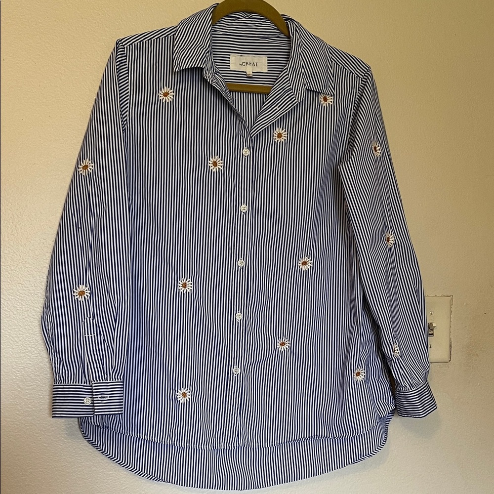 THE GREAT. Blue and White Striped Button Down Shirt with daisies.